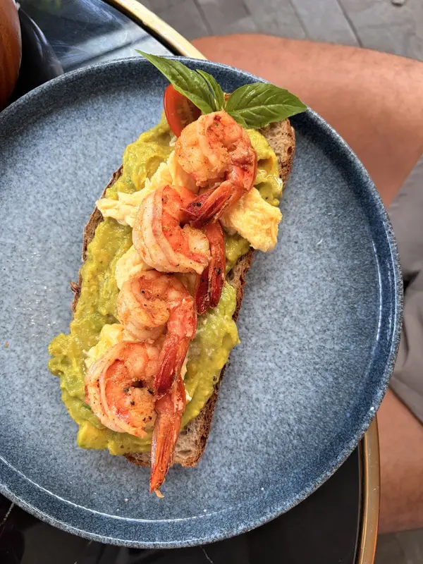 Avocado toast topped with grilled shrimp